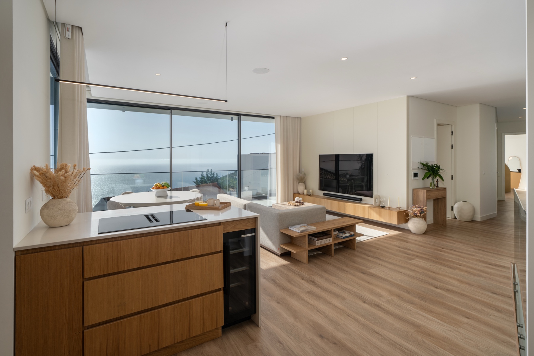 Open-plan living space with terrace access